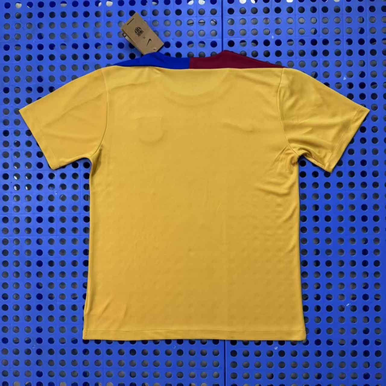 Barcelona's yellow training jersey