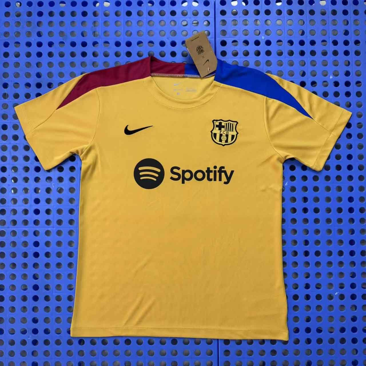 Barcelona's yellow training jersey