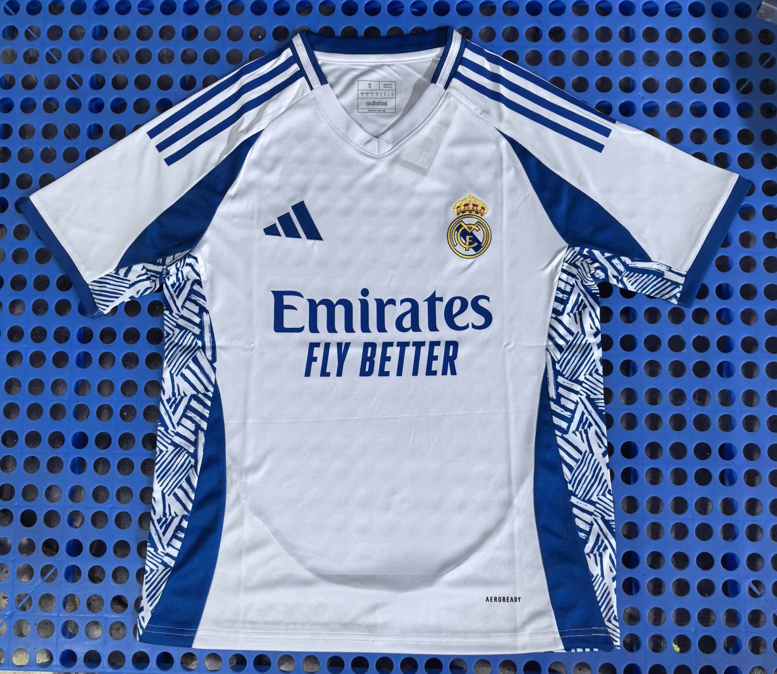 Real Madrid's blue and white training jersey