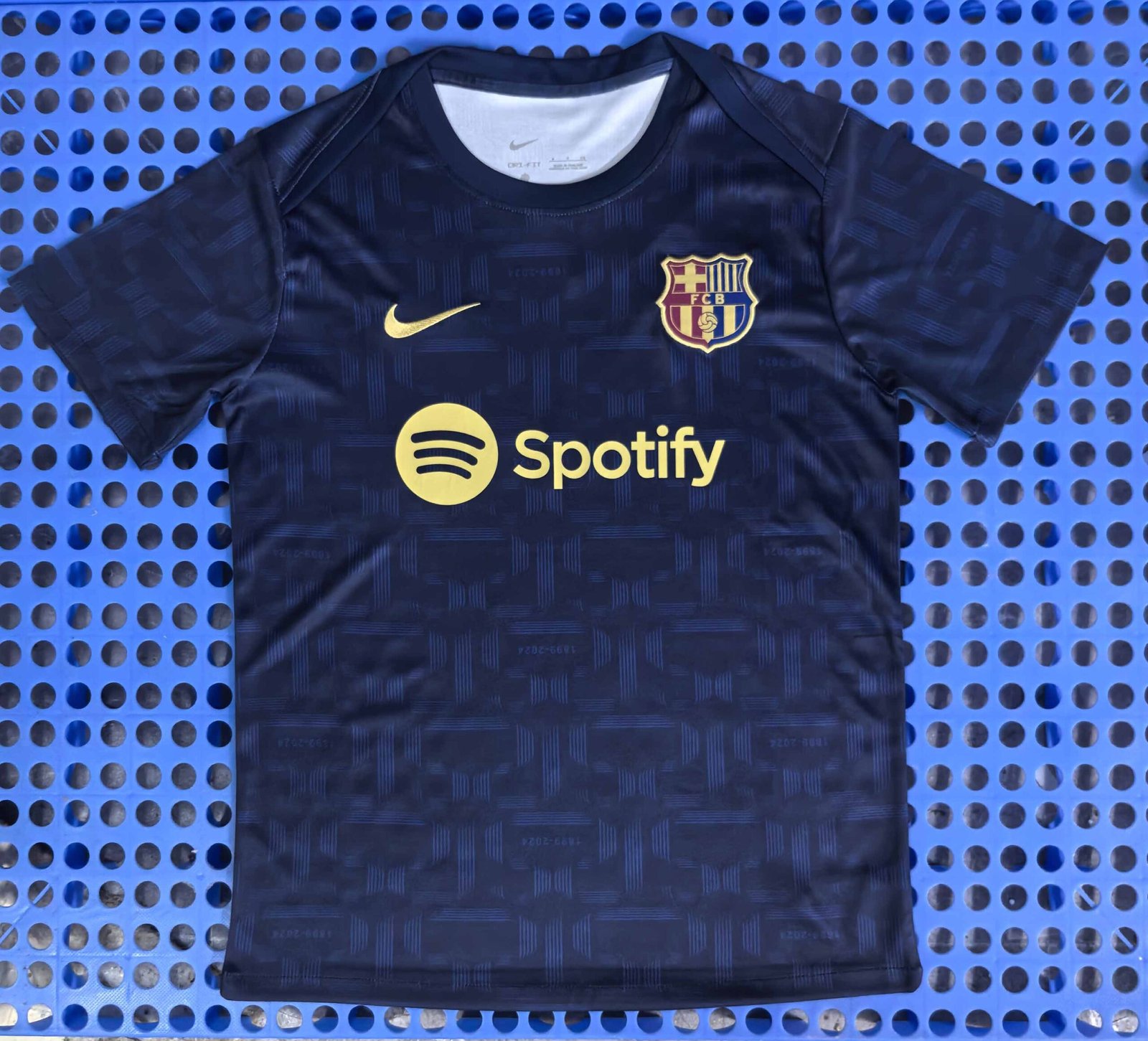 Barcelona's navy blue training jersey