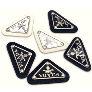 prada triangle metal logo